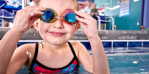 Smiling Child in Goggles